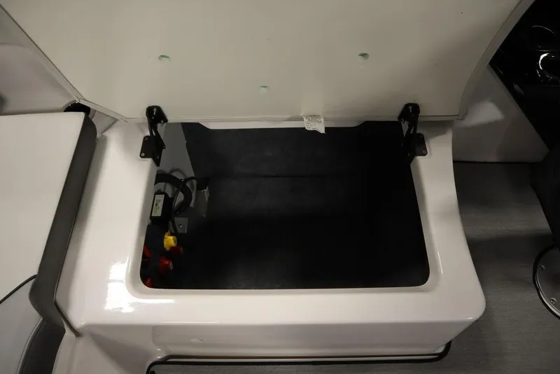 Slide: The Image of Open storage compartment in 2025 Yamaha Boats 250 SX. - 38
