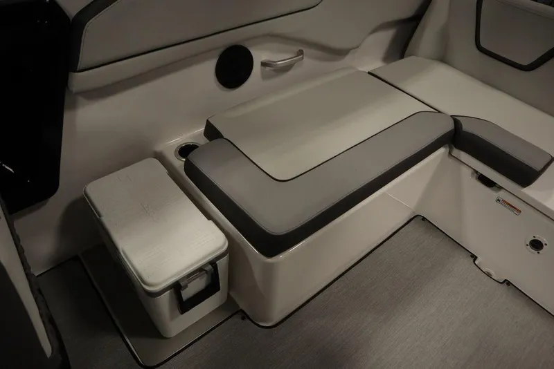 Slide: The Image of 2025 Yamaha Boats 250 SX interior seating with modern design and storage features. - 39