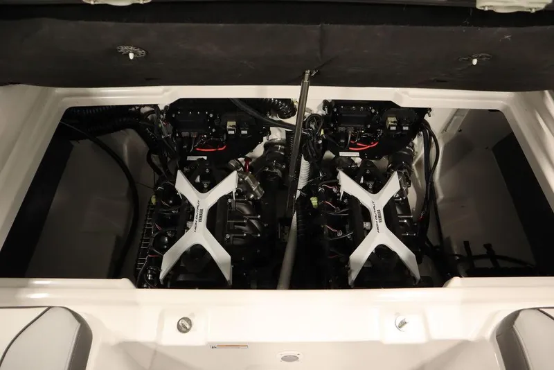 Slide: The Image of 2025 Yamaha Boats 250 SX engine compartment with dual engines. - 42