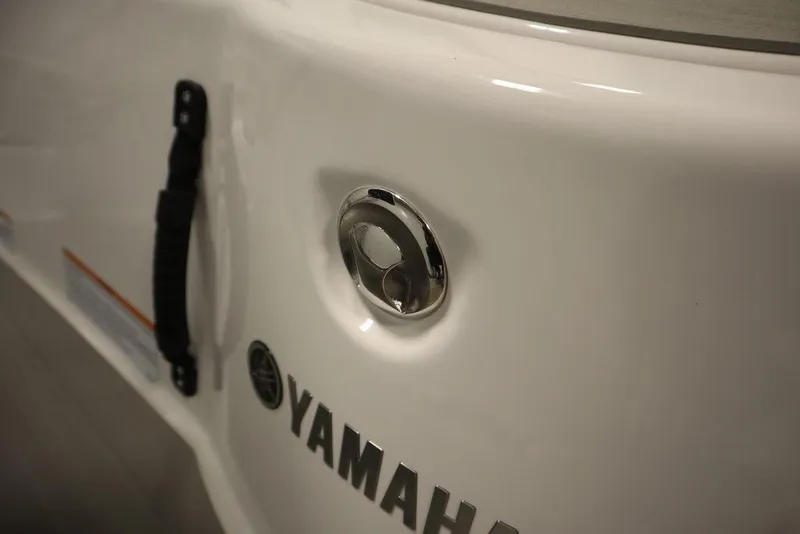 Slide: The Image of Close-up of 2025 Yamaha Boats 250 SX, featuring sleek design and branding. - 46