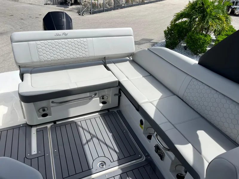 Slide: The Image of 2021 Sea Ray SDX 250 Outboard boat interior with sleek seating and modern design. - 11