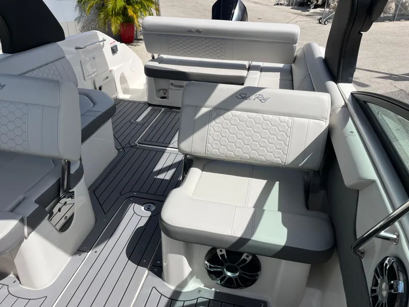 Slide: The Image of 2021 Sea Ray SDX 250 Outboard boat interior with luxurious seating and modern design. - 13