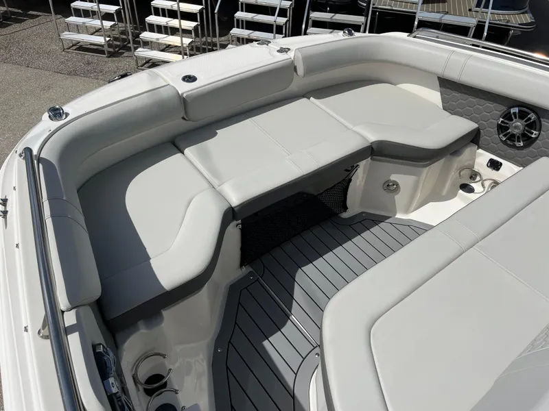 Slide: The Image of 2021 Sea Ray SDX 250 Outboard boat interior with spacious seating and modern design. - 15