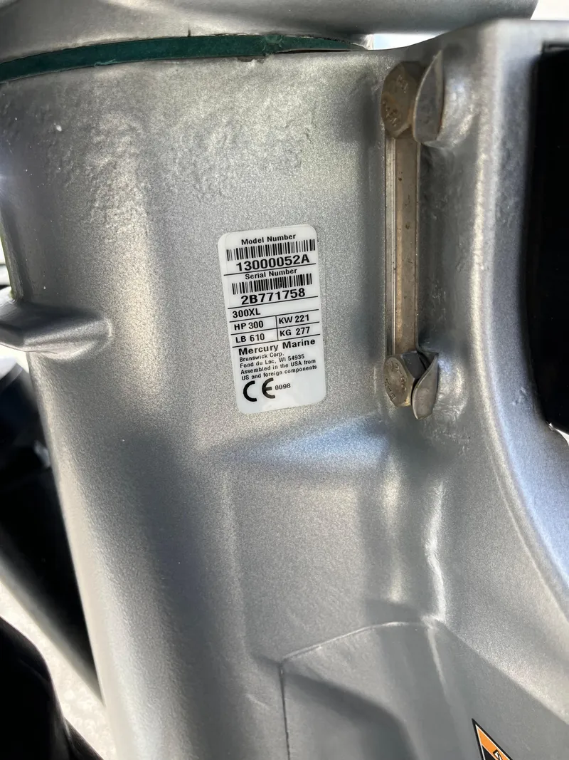 Slide: The Image of Close-up of 2021 Sea Ray SDX 250 Outboard engine serial number label. - 16