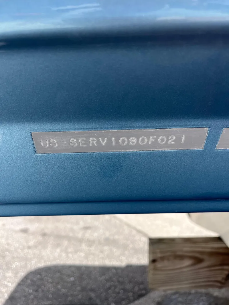 Slide: The Image of 2021 Sea Ray SDX 250 Outboard hull identification number close-up. - 17