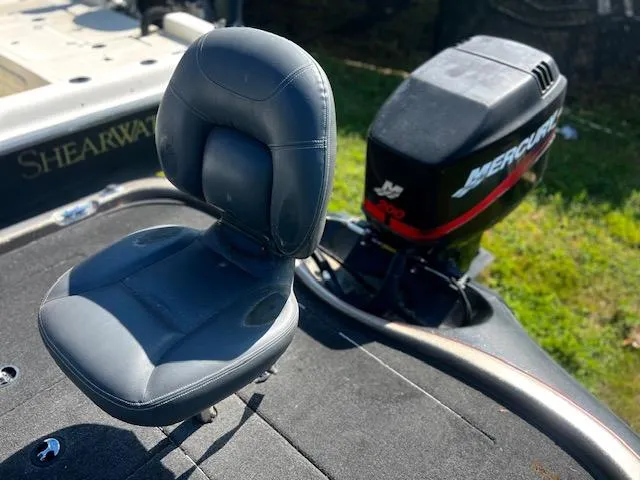 Slide: The Image of 2003 Ranger 195VS boat seat and Mercury outboard motor on deck. - 6