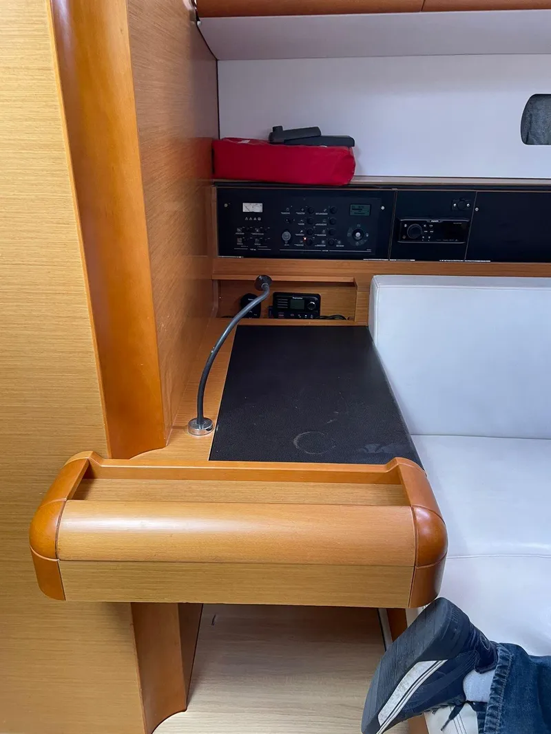 Slide: The Image of Interior of 2016 Jeanneau Sun Odyssey 479 yacht with navigation station. - 22
