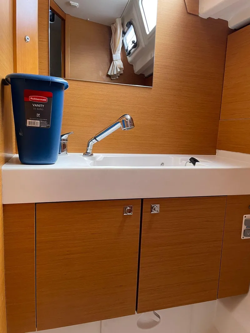 Slide: The Image of Bathroom sink area in 2016 Jeanneau Sun Odyssey 479 yacht. - 26
