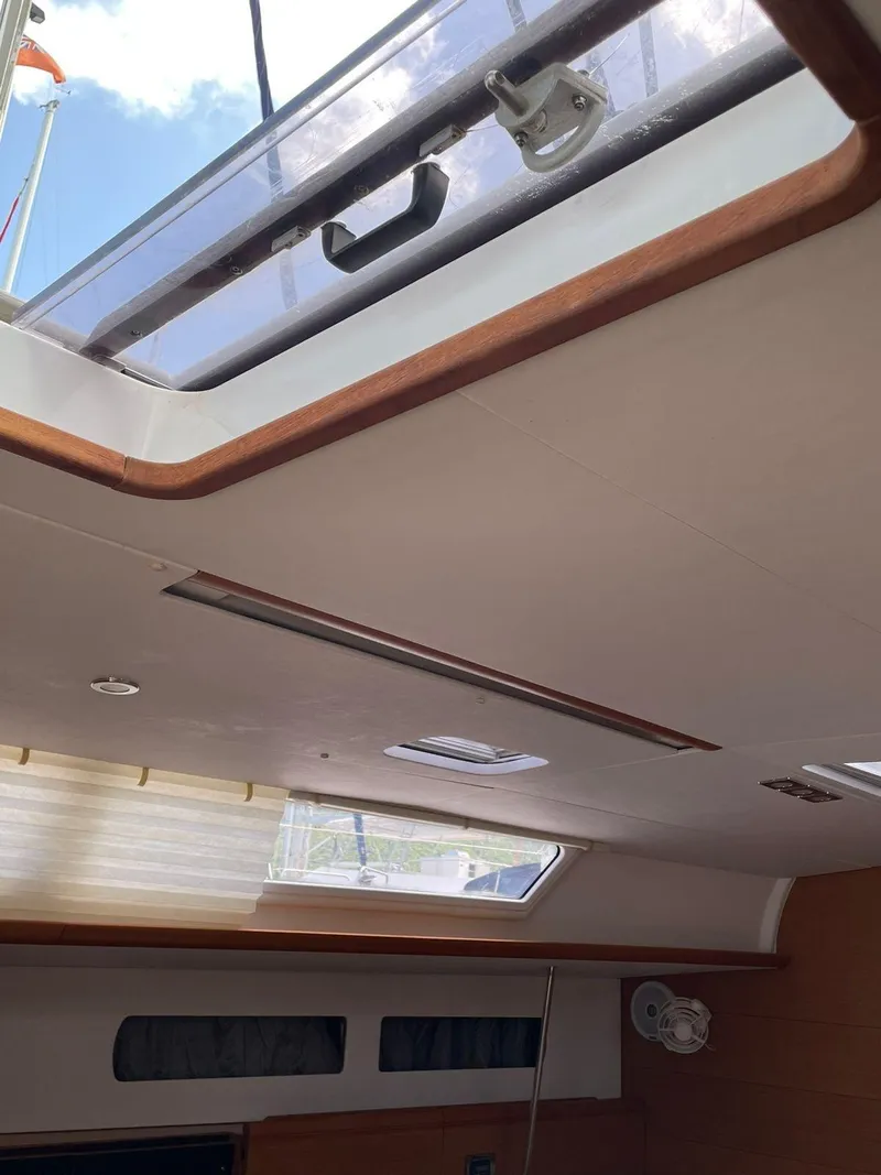 Slide: The Image of Interior view of 2016 Jeanneau Sun Odyssey 479 sailboat with skylight and modern design. - 32