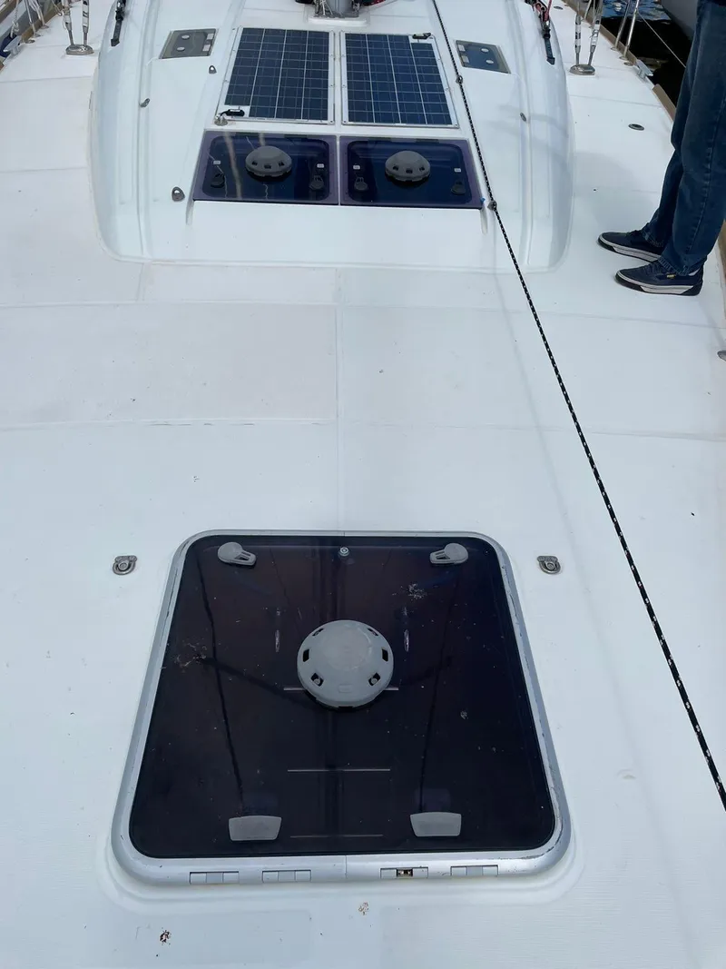 Slide: The Image of 2016 Jeanneau Sun Odyssey 479 yacht deck with solar panels and hatch. - 40