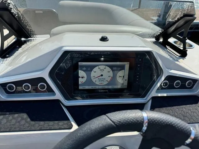 Slide: The Image of Dashboard of 2021 Manitou RF 23 Oasis VP with digital display and steering wheel. - 13