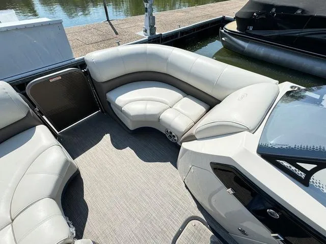 Slide: The Image of 2021 Manitou RF 23 Oasis VP pontoon boat interior with plush seating and modern design. - 14