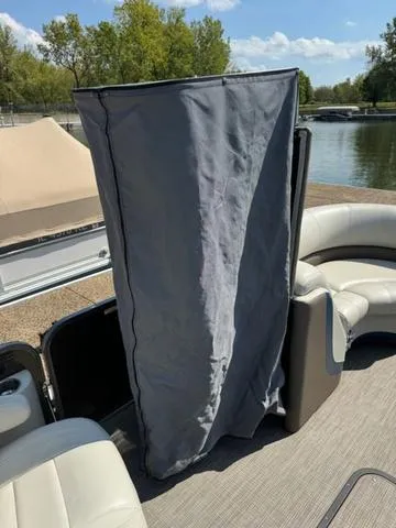 Slide: The Image of 2021 Manitou RF 23 Oasis VP pontoon boat with privacy curtain on deck. - 17
