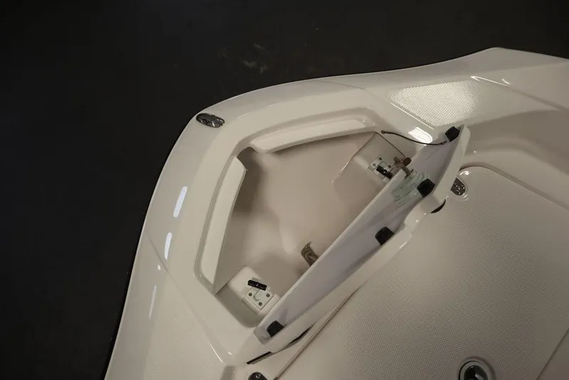 Slide: The Image of Open storage compartment on 2025 Yamaha Boats 190 FSH Sport. - 11