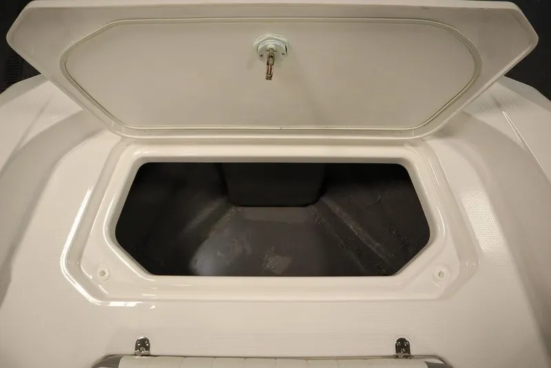 Slide: The Image of Open storage compartment on 2025 Yamaha Boats 190 FSH Sport. - 12