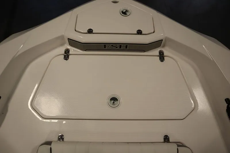 Slide: The Image of 2025 Yamaha Boats 190 FSH Sport deck, featuring sleek design and storage compartments. - 13