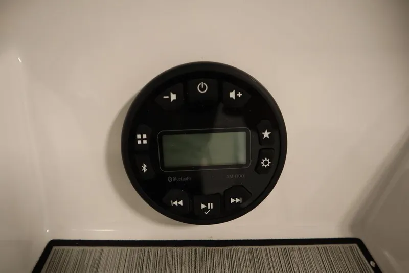 Slide: The Image of Control panel of 2025 Yamaha Boats 190 FSH Sport, featuring various function buttons. - 28