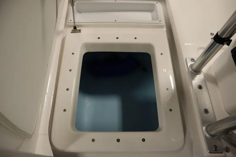 Slide: The Image of 2025 Yamaha Boats 190 FSH Sport livewell interior view. - 36