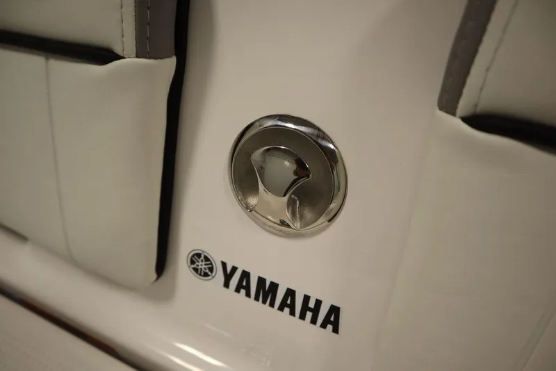 Slide: The Image of Close-up of 2025 Yamaha Boats 190 FSH Sport logo and hardware detail. - 42