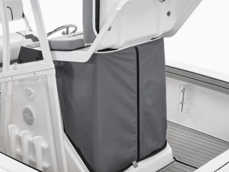 Slide: The Image of 2025 Yamaha Boats 190 FSH Sport interior detail with gray protective cover. - 48