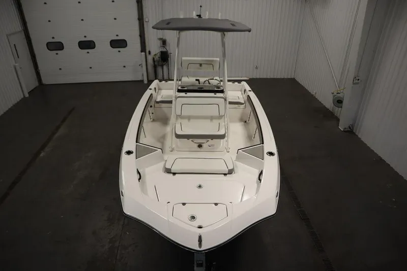 Slide: The Image of 2025 Yamaha Boats 190 FSH Sport in indoor storage, top view. - 7