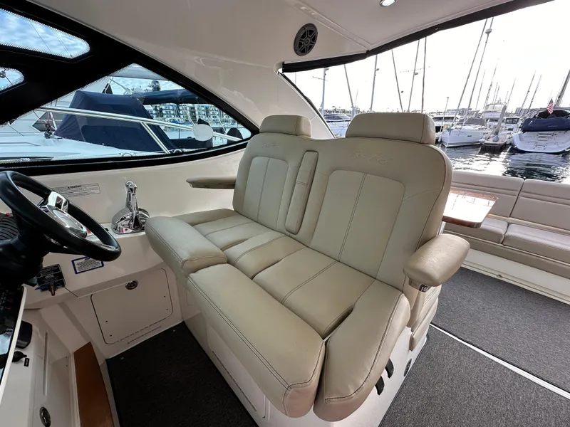Slide: The Image of Luxurious interior of 2015 Sea Ray 410 Sundancer yacht with plush seating. - 8