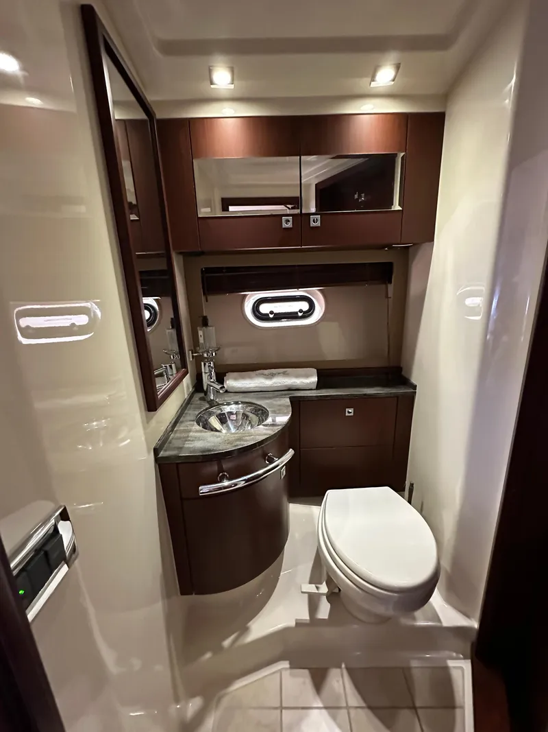 Slide: The Image of Luxurious bathroom in 2014 Sea Ray 450 Sundancer yacht with modern fixtures. - 39