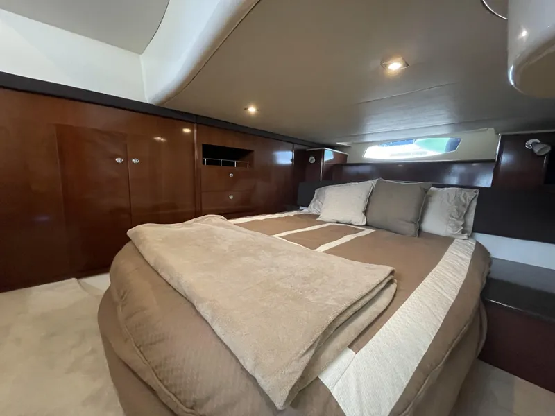 Slide: The Image of Luxurious bedroom interior of 2011 Meridian 441 Sedan Bridge yacht. - 14