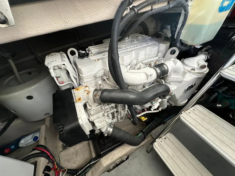 Slide: The Image of Engine compartment of 2011 Meridian 441 Sedan Bridge, showcasing detailed mechanical components. - 27