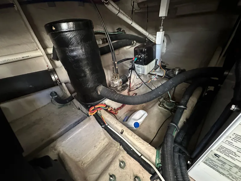 Slide: The Image of Engine room of 2011 Meridian 441 Sedan Bridge, showcasing wiring and components. - 29
