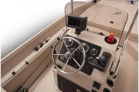 Slide: The Image of 2021 G3 Bay 17 boat console with steering wheel and navigation equipment. - 11