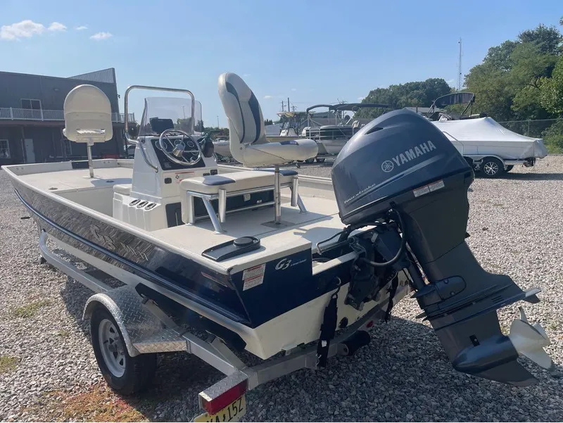 Slide: The Image of 2021 G3 Bay 17 boat with Yamaha outboard motor on a trailer. - 20