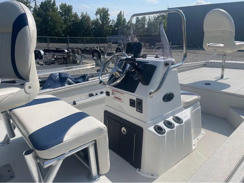 Slide: The Image of 2021 G3 Bay 17 boat interior with steering console and seating. - 6