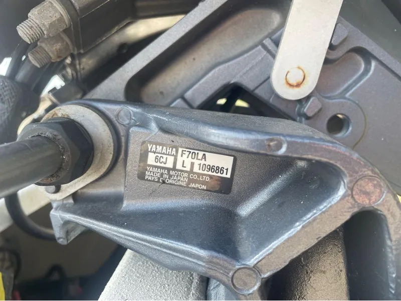 Slide: The Image of Close-up of Yamaha F70LA engine part with label, G3 Bay 17, 2021 model. - 9