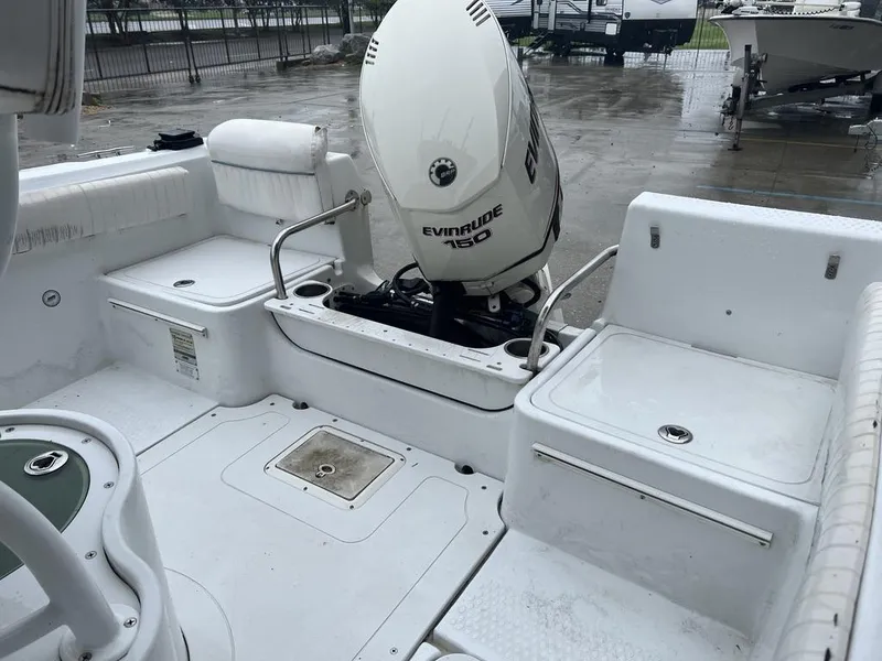 Slide: The Image of 2008 Triumph 215 CC boat interior with Evinrude 150 outboard motor. - 5