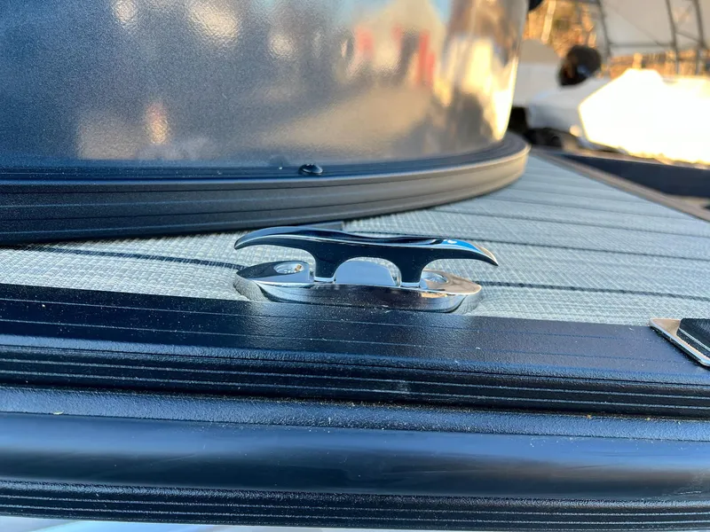 Slide: The Image of Close-up of 2025 Sylvan L1 DLZ boat cleat on deck. - 21