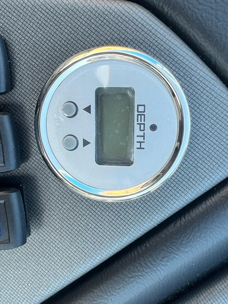 Slide: The Image of Depth gauge on 2025 Sylvan L1 DLZ boat dashboard. - 28