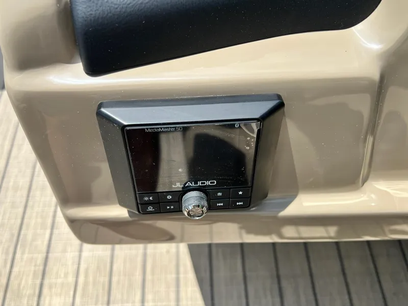 Slide: The Image of JL Audio MediaMaster 50 installed on 2025 Sylvan L1 DLZ boat dashboard. - 33