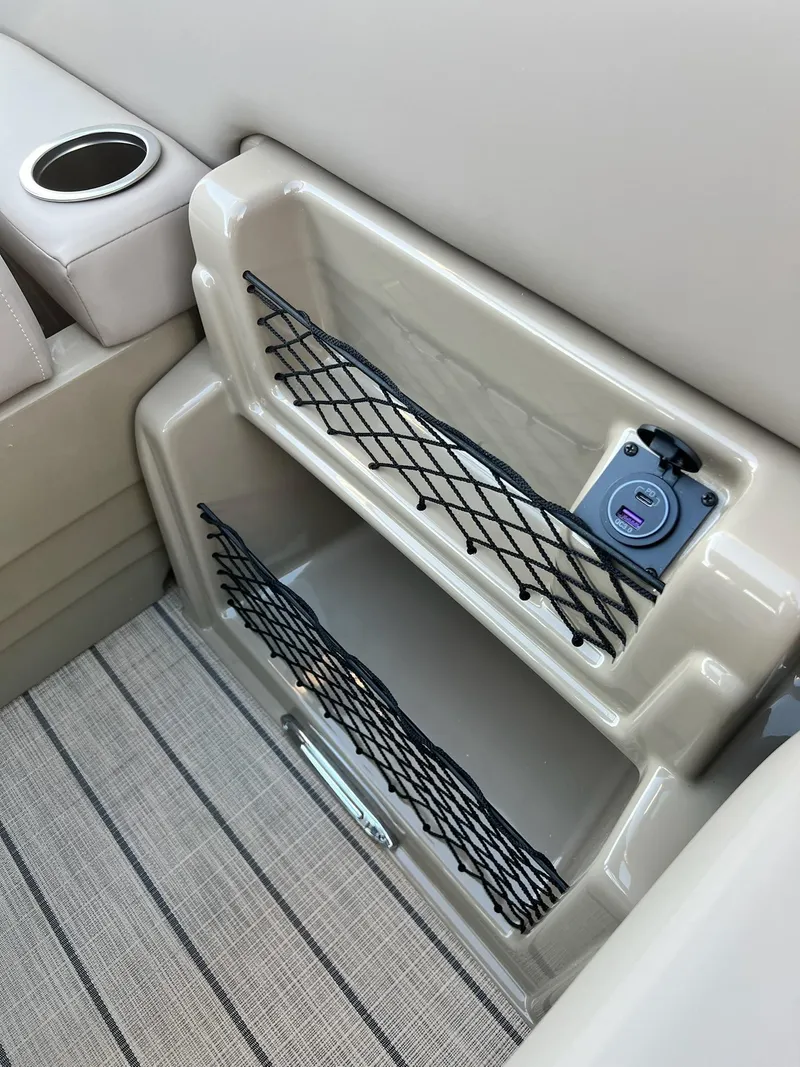 Slide: The Image of 2025 Sylvan L1 DLZ interior storage with netting and USB port. - 47