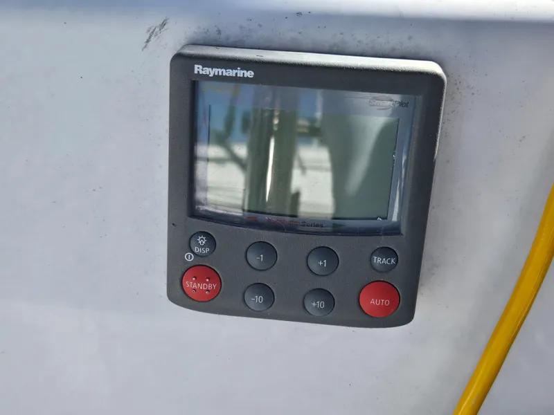 Slide: The Image of Raymarine autopilot control on 1994 Hunter 33.5 sailboat dashboard. - 18