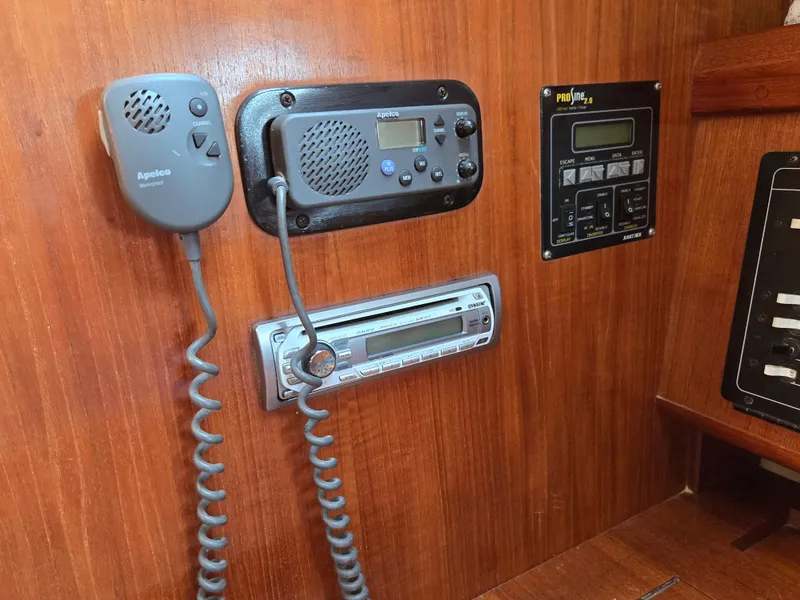 Slide: The Image of Boat communication and control panel on a 1994 Hunter 33.5 sailboat. - 20