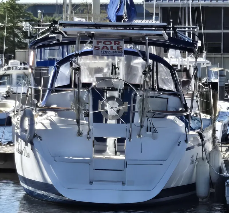 Slide: The Image of Sailboat for sale, 1994 Hunter 33.5, docked at marina. - 34