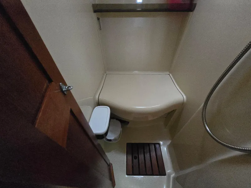 Slide: The Image of Compact bathroom in 1994 Hunter 33.5 boat with shower and toilet. - 38