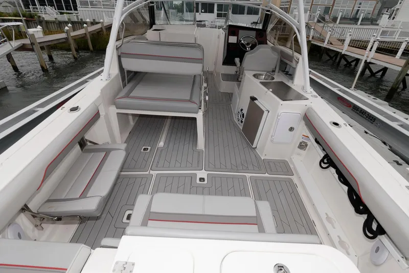 Slide: The Image of 2023 Solara S-250 DC boat interior with spacious seating and modern amenities. - 2