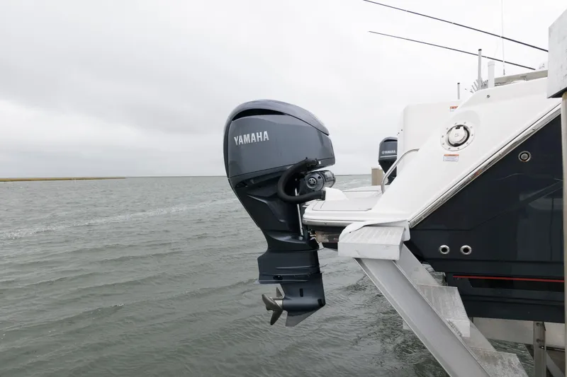 Slide: The Image of 2023 Solara S-250 DC with Yamaha outboard motor on water. - 20