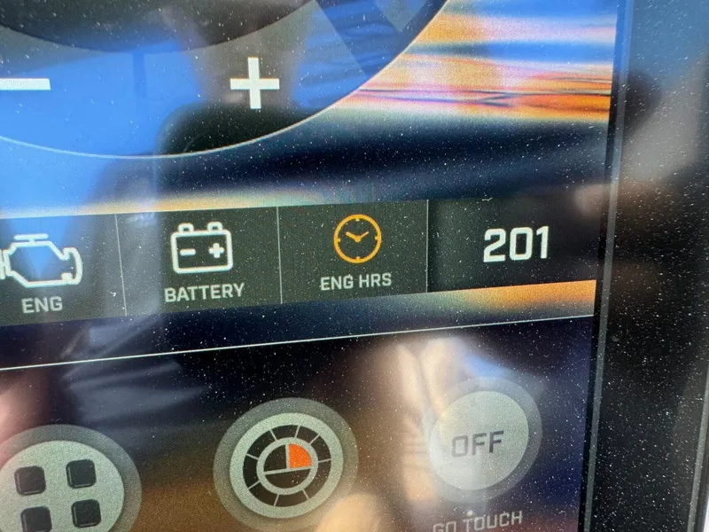Slide: The Image of Dashboard display of 2020 Tigé 23 RZX showing 201 engine hours. - 16