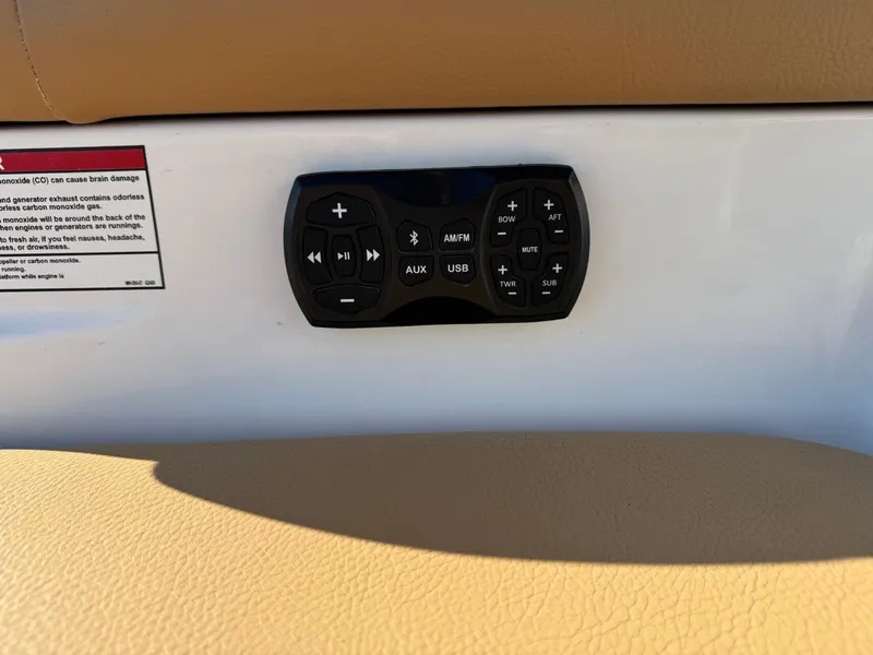 Slide: The Image of Control panel on 2020 Tigé 23 RZX boat, featuring audio and USB inputs. - 7