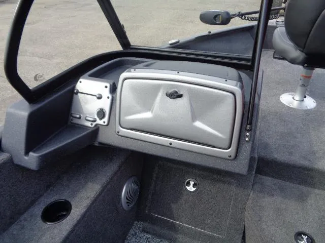 Slide: The Image of 2025 Tracker Pro Guide V-175 Combo boat interior with storage compartment and seating. - 10