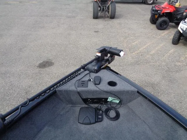 Slide: The Image of 2025 Tracker Pro Guide V-175 Combo boat interior with trolling motor and control panel. - 11