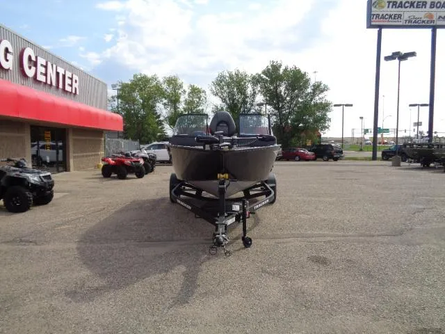 Slide: The Image of 2025 Tracker Pro Guide V-175 Combo boat on trailer at dealership lot. - 5